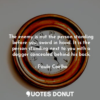  The enemy is not the person standing before you, sword in hand. It is the person... - Paulo Coelho - Quotes Donut