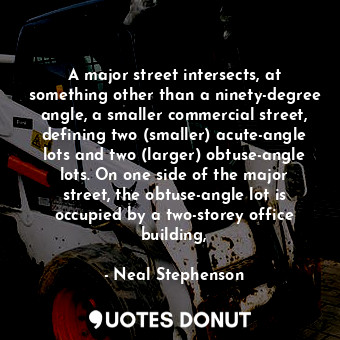 A major street intersects, at something other than a ninety-degree angle, a smaller commercial street, defining two (smaller) acute-angle lots and two (larger) obtuse-angle lots. On one side of the major street, the obtuse-angle lot is occupied by a two-storey office building,